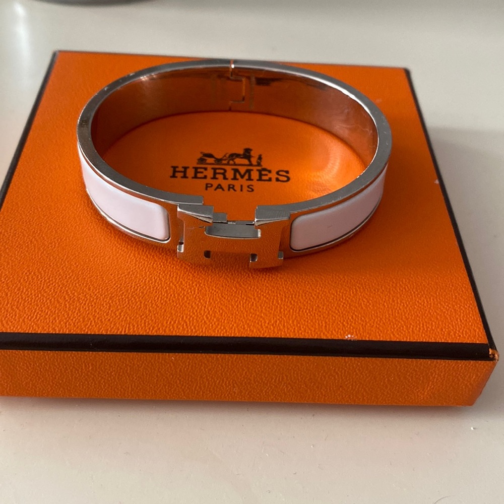 white and silver hermes click H bracelet